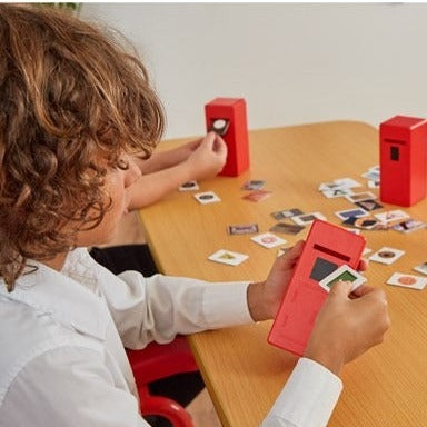 Shape Posting Game, Shape Posting Game,Shape recognition,Fine motor skills games,school numeracy resources,classroom numeracy resources, Shape Posting Game,The Shape Posting Game is a dynamic and educational activity designed to enhance children's shape recognition, sorting, and counting skills. Featuring four brightly coloured "post-boxes" and 40 double-sided picture cards, this engaging game encourages young learners to identify and match shapes in a fun, hands-on way. ,Shape Posting GameThe Shape Posting