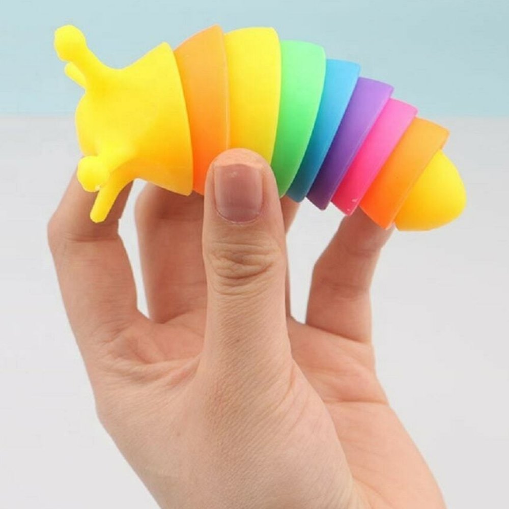 Slug Fidget Toy 10cm Rainbow, Slug Fidget Toy 10cm Rainbow,Rainbow Fidget Slug sensory slug,sensory fidget toy,,Sensory Toys, Special Needs Toys, Stretchy centipede, Stretchy character, Tentacle centipede toy, tactile toys, stretchy and squidgy toys, Slug Fidget Toy 10cm Rainbow,Introducing our mesmerizing Slug Fidget Toys! Measuring a perfect 10cm in size, these little creatures will surely capture your attention with their vibrant rainbow theme. Designed with ingenuity in mind, these fidget toys offer an 