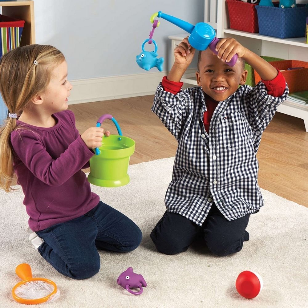 Sprouts Reel It, Sprouts Reel It,Fishing Game,Sensory Toys, Special Needs Toys, Painted fish game, Wooden fish game, Matching fish game, developmental skills, motor-skills, gross motor skills, vestibular and proprioception toys, Sprouts Reel It,Gone fishing’! Reel in the freshest catch of the day with this fun Sprouts Reel It fishing set, perfect for young outdoor enthusiasts. The fishing pole can be used to catch the bobber or one of the 3 colourful fish. Once an object is hooked, place it in the bucket or