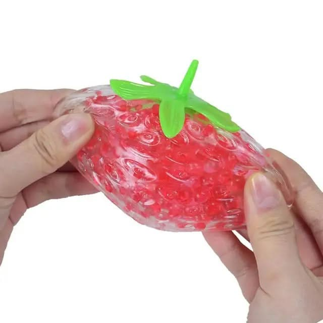 Strawberry Stress Ball, Strawberry Stress Ball,stress ball,adhd,autism,fiddle toys,stress toys,fidget toys, Strawberry Stress Ball – A Fun & Satisfying Sensory Squish The Strawberry Stress Ball is a vibrantly designed, soft, and squishy fidget toy, perfect for stress relief, sensory play, and endless squeezing fun. Shaped like a juicy strawberry, this stretchy and tactile stress ball offers a soothing squish, making it ideal for kids and adults looking for a fun way to keep hands busy. Super Squishy, Stretc