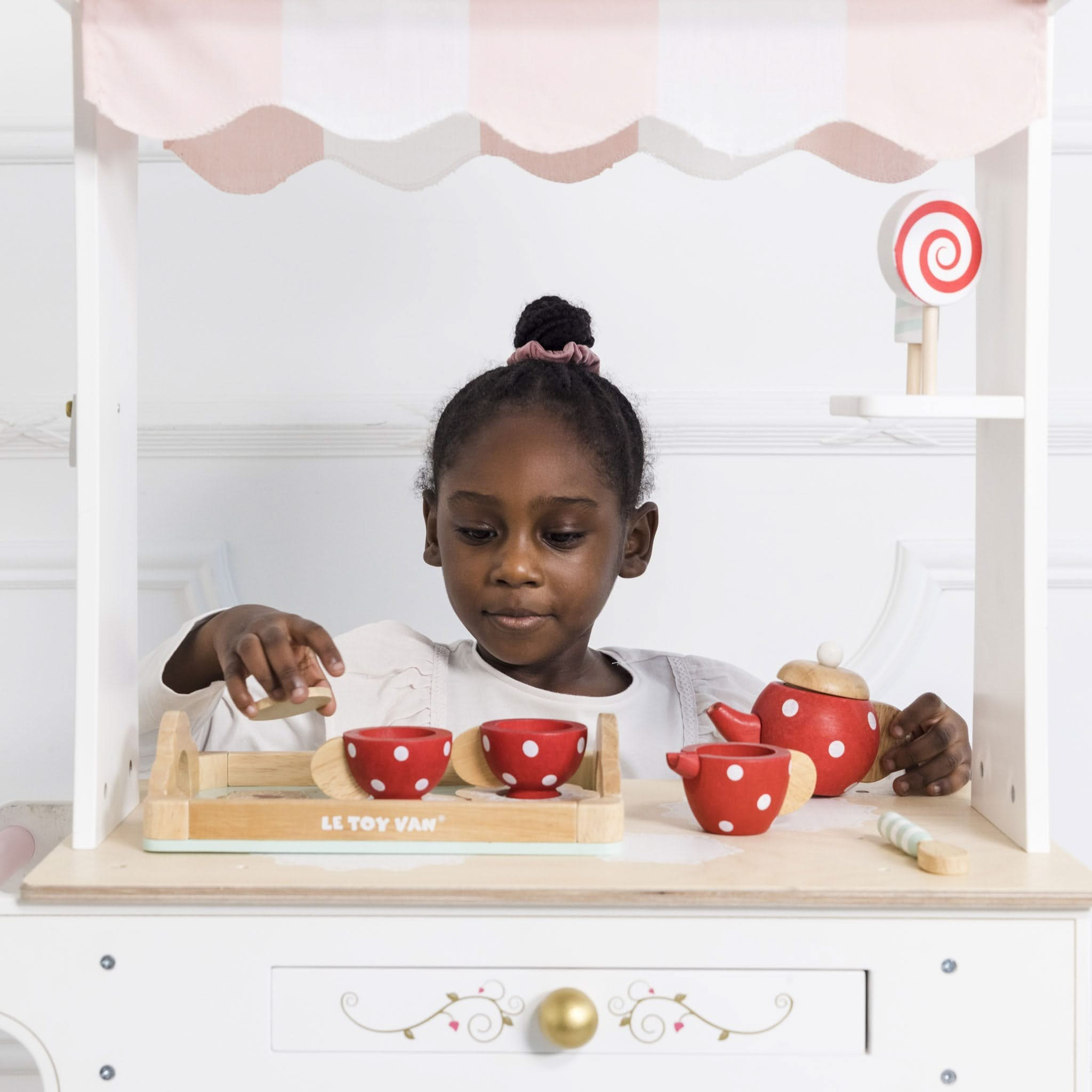 Tea & Treats Trolley Market Stall, Tea & Treats Trolley Market Stall,pretend play wooden kitchen,toddler kitchen,childrens kitchen toy, Tea & Treats Trolley Market Stall – A Delightful Afternoon Tea Adventure! Step into a world of elegance and charm with the Tea & Treats Trolley Market Stall, a beautifully designed wooden tea trolley that invites little hosts to serve up afternoon tea in style. With its vintage-inspired design, this timeless playset is a true showstopper, making it a magical gift to treasur