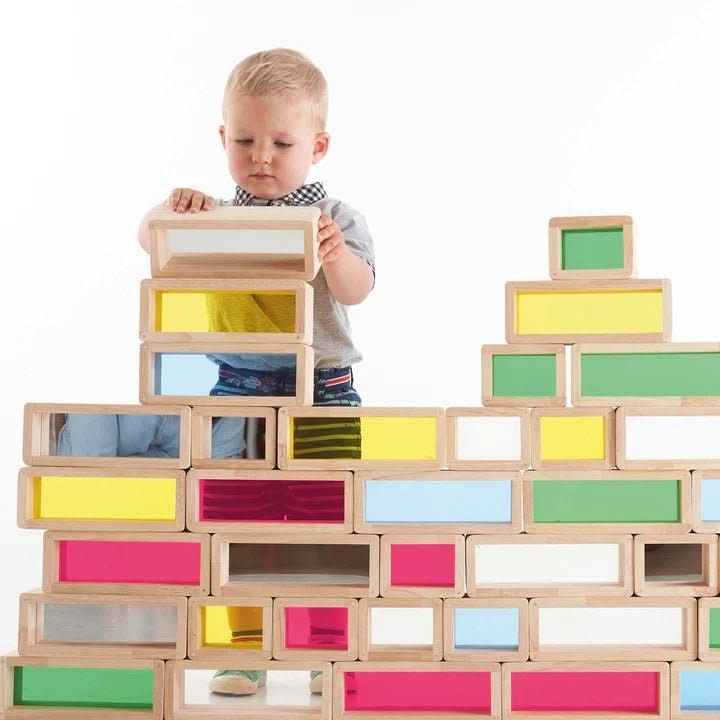 TickiT Rainbow Bricks, TickiT Rainbow Bricks, Jumbo wooden blocks, TikIT wooden blocks, TickIT Toys, Sensory Blocks, Large Sensory Blocks, TickiT Rainbow Bricks,TickiT® Rainbow Bricks – Build, Explore, and Create with Colourful Sensory Play Spark your child’s imagination with the TickiT® Rainbow Bricks, a captivating set of giant rubberwood bricks featuring vibrant acrylic centres. Designed to combine tactile, visual, and creative exploration, these beautiful bricks encourage ,TickiTTickiT® Rainbow Bricks –