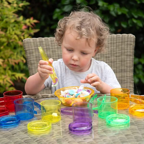 Translucent Colour Tweezers Pk12, Translucent Colour Tweezers Pk12,TickiT® Translucent Colour Tweezers,TickiT® Translucent toys,TickiT®, Translucent Colour Tweezers – A Fun and Engaging Fine Motor Development Tool The Translucent Colour Tweezers are the perfect hands-on resource for helping young children develop fine motor skills, hand strength, and coordination. Designed with bright, translucent colours, these child-friendly tweezers make skill-building fun, offering endless opportunities for sorting, gri