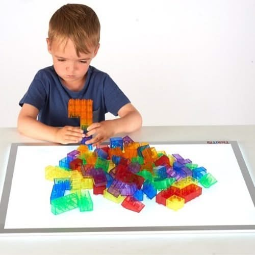 Translucent Module Blocks, Translucent Module Blocks,90 Piece Translucent Module Blocks,Translucent light panel sensory resources,Light panel resources,sensory light panel resources,light box resources,Sensory light box resources toys, Translucent Module Blocks,The Translucent Module Blocks are ideal for improving fine motor skills through imaginative play. Colourful constructions look even more striking when built on a light panel allowing you to create endless play ideas using the Translucent Module Block