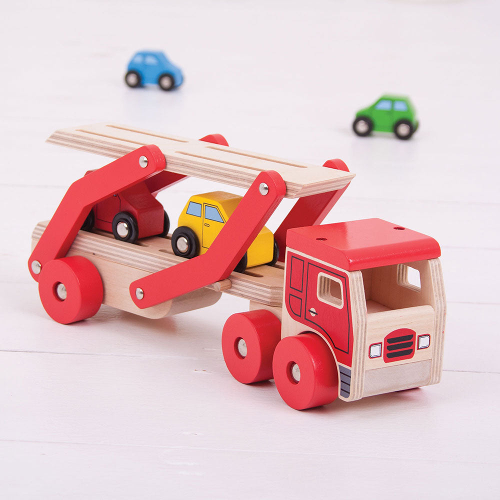 Transporter Lorry, Transporter Lorry,Wooden toys,Traditional wooden toy cars lorries,bigjigs ball fall,bigjigs toys,traditional wooden toys,childrens wooden toys,durable wooden toys,educational wooden toys, Transporter Lorry,This wooden Transporter Lorry Toy helps to develop kids’ dexterity and coordination as they play. It carries a load of four colourful wooden cars (which slot nicely onto the trailer) and is safe for little hands to play with. The toy car transporter lorry’s upper deck can be easily lowe