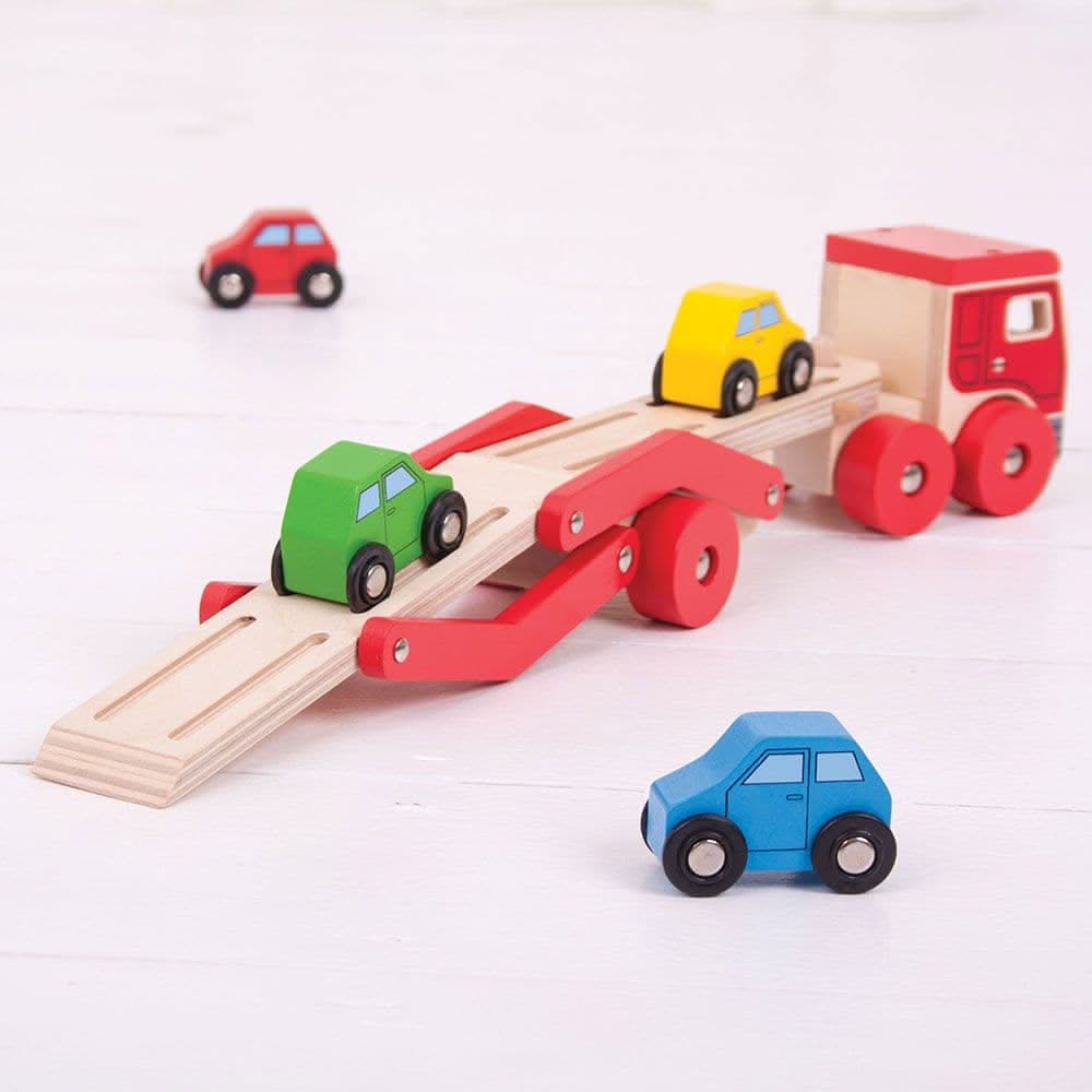 Transporter Lorry, Transporter Lorry,Wooden toys,Traditional wooden toy cars lorries,bigjigs ball fall,bigjigs toys,traditional wooden toys,childrens wooden toys,durable wooden toys,educational wooden toys, Transporter Lorry,This wooden Transporter Lorry Toy helps to develop kids’ dexterity and coordination as they play. It carries a load of four colourful wooden cars (which slot nicely onto the trailer) and is safe for little hands to play with. The toy car transporter lorry’s upper deck can be easily lowe