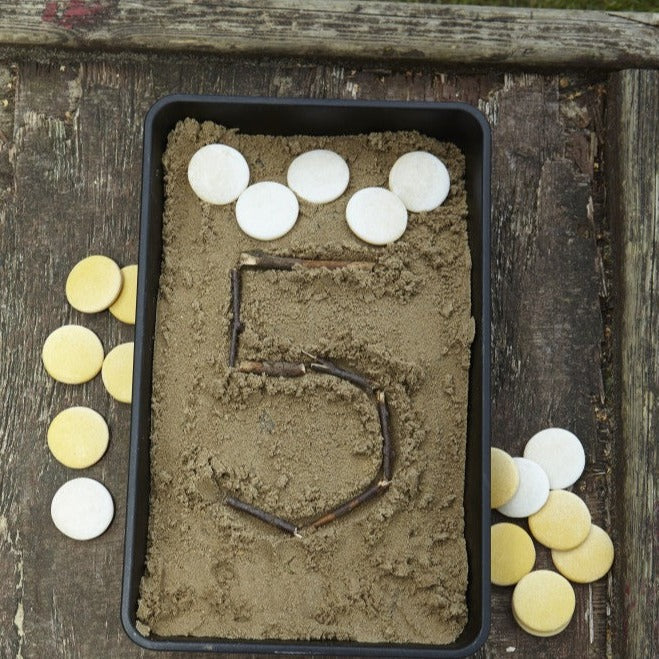 Two-Tone Counting Stones, This invitingly smooth set of 20 double-sided stones is ideal for counting, pattern making, number bonds, and sorting, among other maths concepts. These durable counters are made from a stone and resin mix and can be used outside, in water, and in sand. Their tactile nature encourages exploration, interaction and open-ended play. They are ideal for use with our 10-Frame Tray, which supports sequencing activities and an understanding of number arrays. Set contains 20 two-tone stones