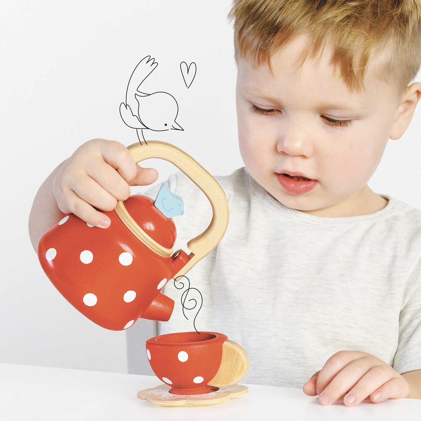 Vintage Dotty Wooden Kettle, Vintage Dotty Wooden Kettle,Pretend play,pretend play kitchen toys,kitchen toys,pretend play household,children's imaginative play ideas, Vintage Dotty Wooden Kettle,Vintage Dotty Wooden Kettle Serve a delightful traditional cuppa with this charming Vintage Dotty Wooden Kettle. Styled in a bold red with playful white polka dots, this beautifully crafted wooden kettle will spark imaginations and bring endless joy to little hosts. Perfect for interactive tea parties with friends, 