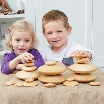 Wooden Stacking Pebbles, Wooden Stacking Pebbles,Stacking Pebbles,sensory pebbles,wooden pebble toys,,bigjigs stacking pebbles, Wooden Stacking Pebbles,The Wooden Stacking Pebbles are a charming and engaging toy that encourage children to explore balance, creativity, and dexterity. With no set guidelines, children can experiment with different stacking methods to see how high they can build before the pebbles tumble down. This open-ended play fosters spatialThe Wooden Stacking Pebbles are a charming and eng